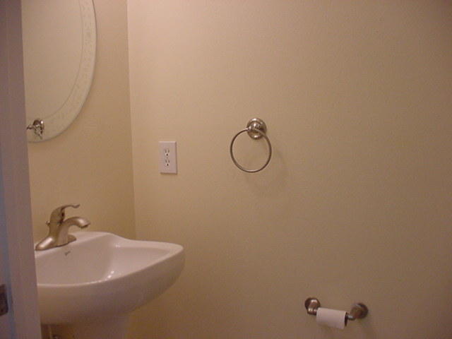 47 Bald Eagle Court Santa Rosa Beach, FL 32459 - Photo 11 of 26 a bathroom with a sink and mirror