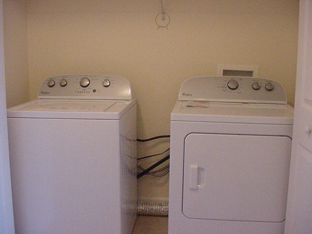 47 Bald Eagle Court Santa Rosa Beach, FL 32459 - Photo 14 of 26 a utility room with dryer and washer