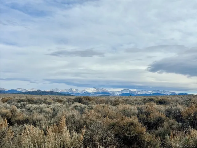 a view of mountain with lake view