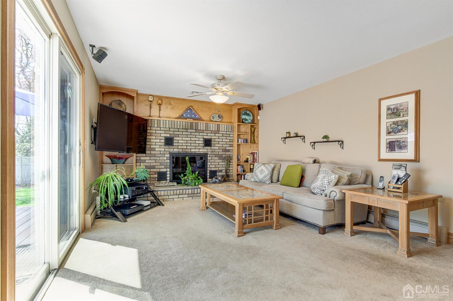 76 Pennington Road New Brunswick, NJ 08901 - Photo 15 of 32 Spacious family room with wood burning fireplace