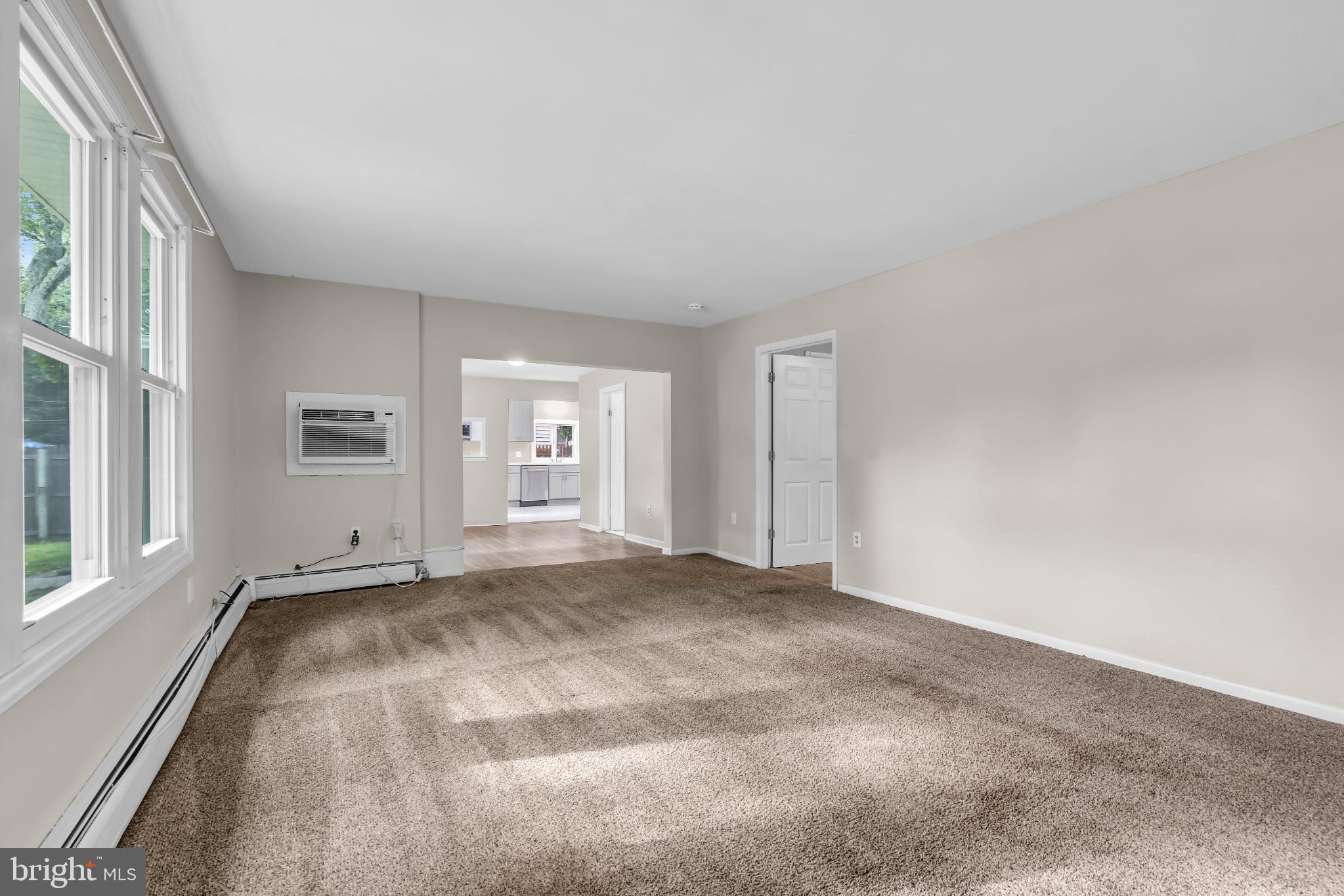 102 Sunset Street Browns Mills, NJ 08015 - Photo 14 of 27 a view of an empty room with a window