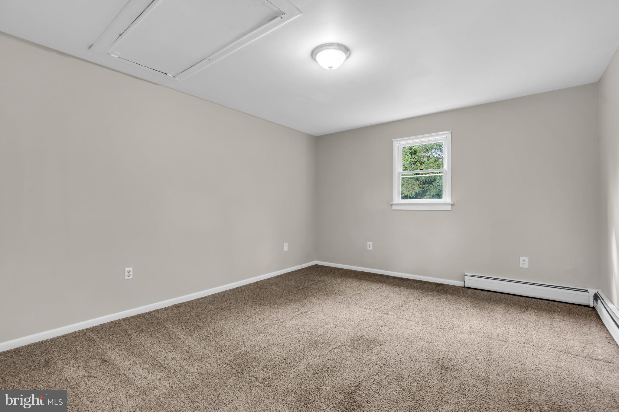 102 Sunset Street Browns Mills, NJ 08015 - Photo 20 of 27 an empty room with a window