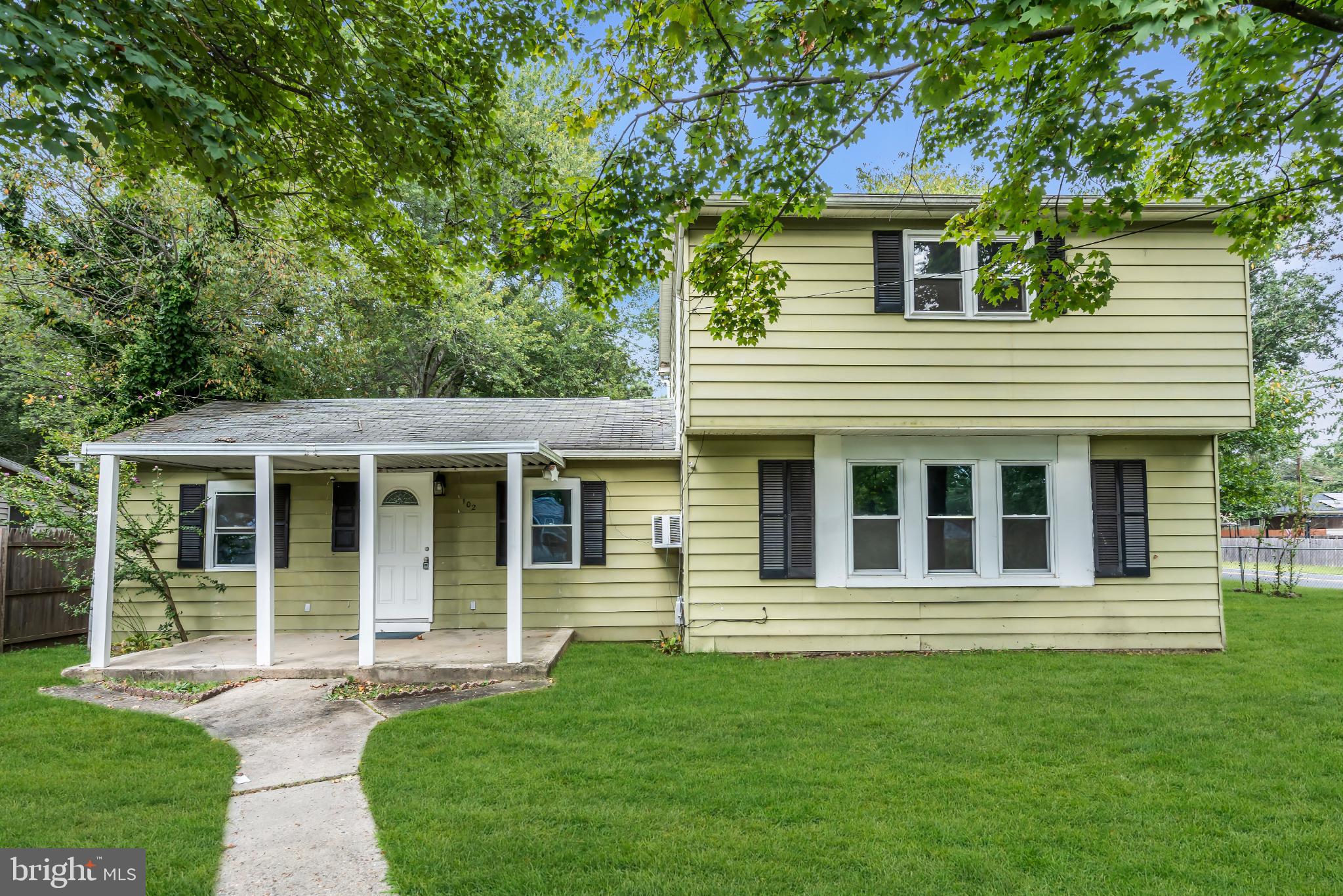 102 Sunset Street Browns Mills, NJ 08015 - Photo 2 of 27 front view of a house with a yard