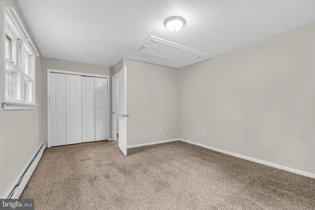 a view of a backyard with a small cabin