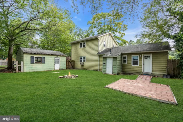 front view of a house that has a yard