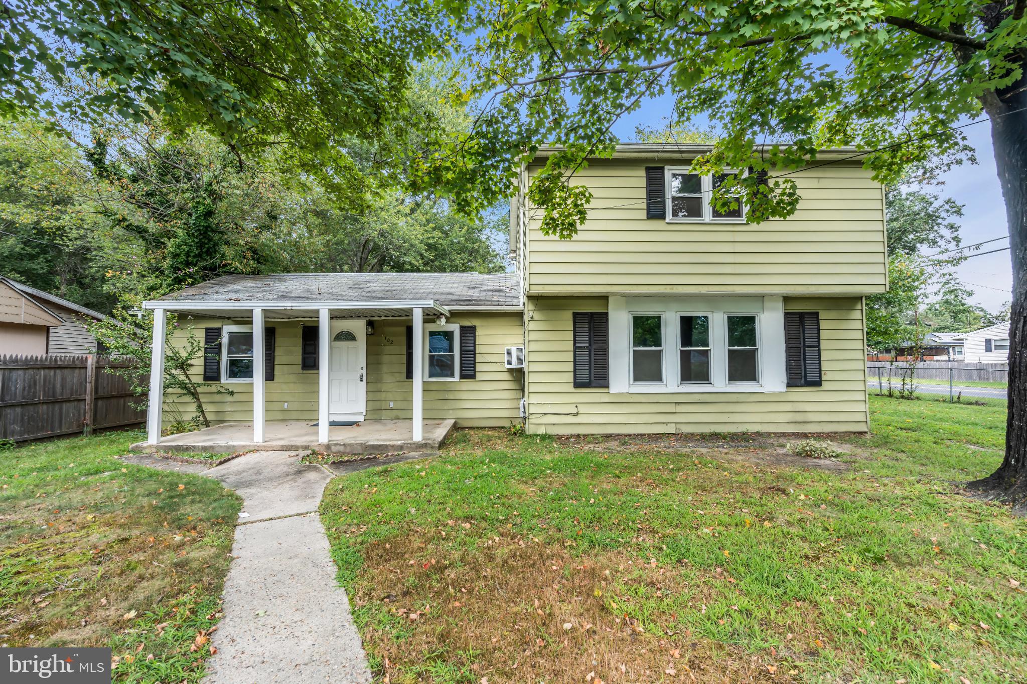 102 Sunset Street Browns Mills, NJ 08015 - Photo 26 of 27 front view of a house that has a yard