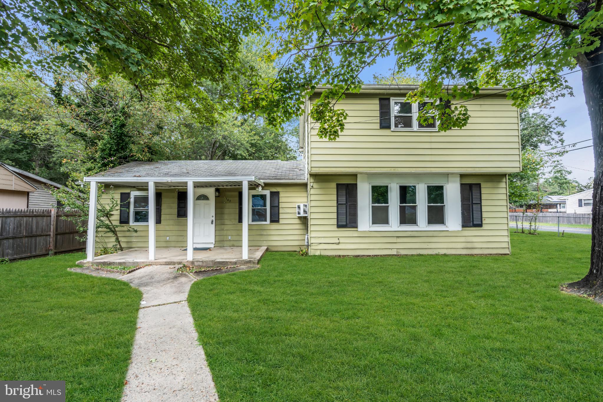 102 Sunset Street Browns Mills, NJ 08015 - Photo 4 of 27 front view of a house with a yard