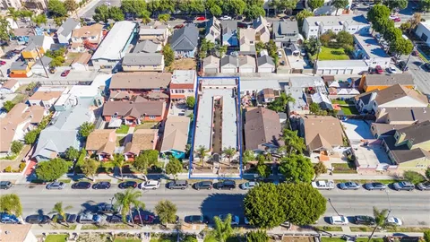 an aerial view of a city with lots of residential buildings