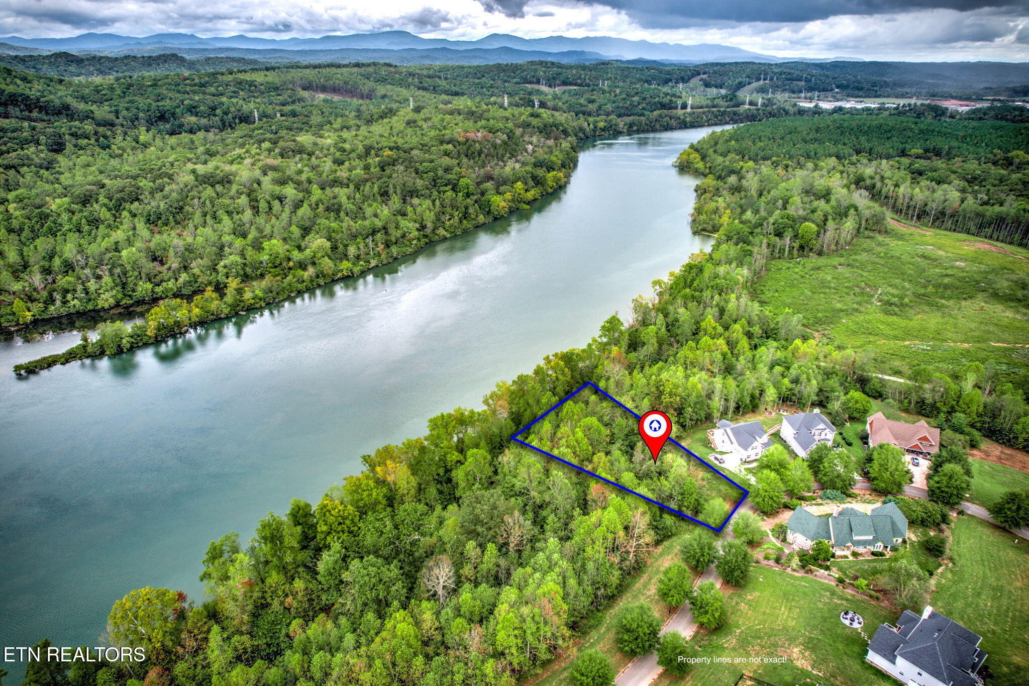 a view of a lake with a mountain and a lake view