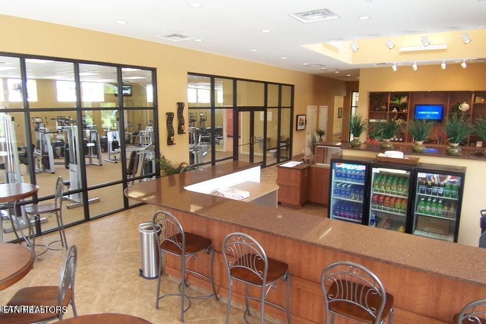 152 Pineberry East Road Oak Ridge, TN 37830 - Photo 15 of 24 a living room with furniture a floor to ceiling window and floor to ceiling window