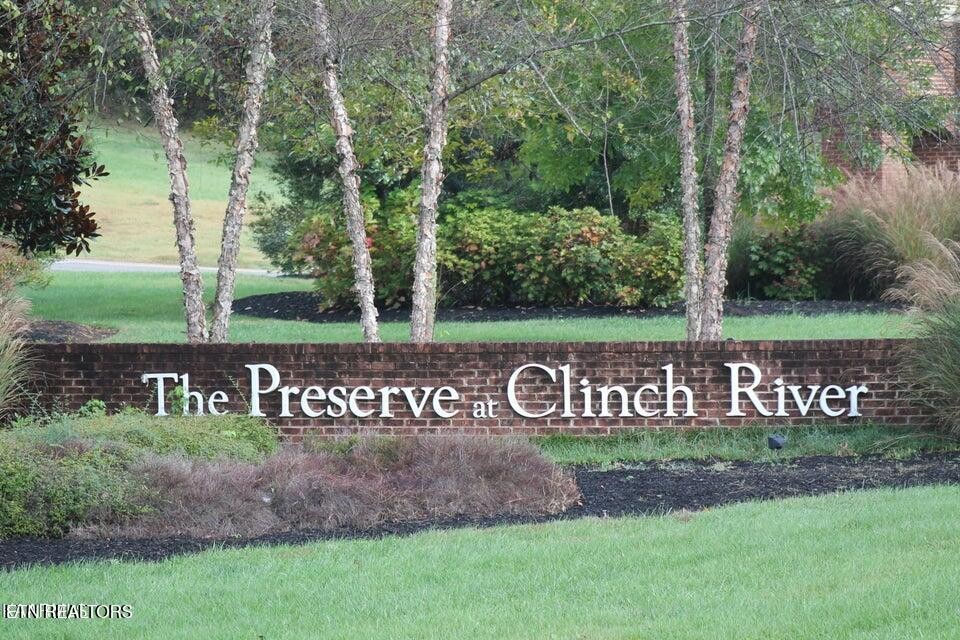 152 Pineberry East Road Oak Ridge, TN 37830 - Photo 10 of 24 a view of park with a bench under large trees