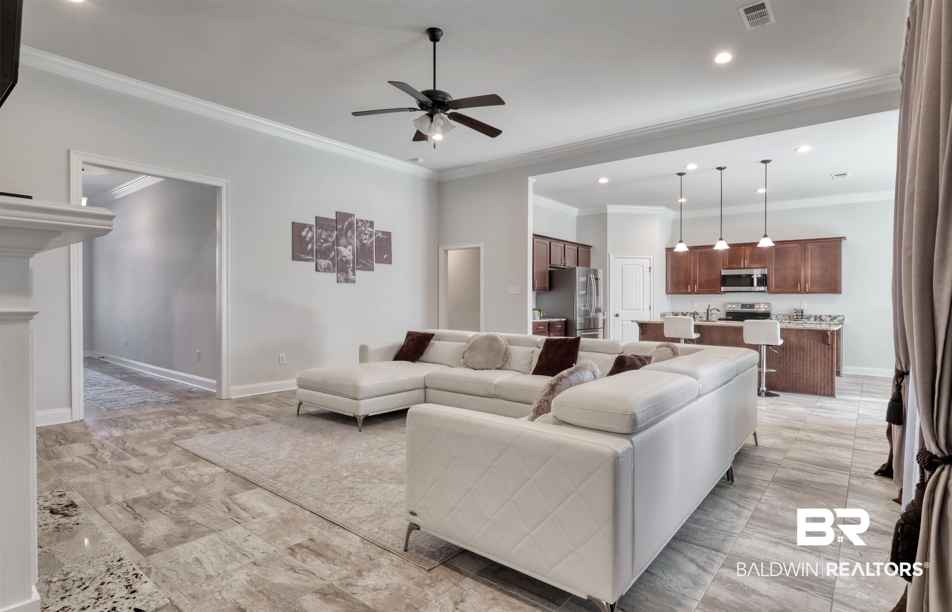992 Dalton Circle Foley, AL 36535 - Photo 4 of 28 Living room with crown molding, ceiling fan, and recessed lighting