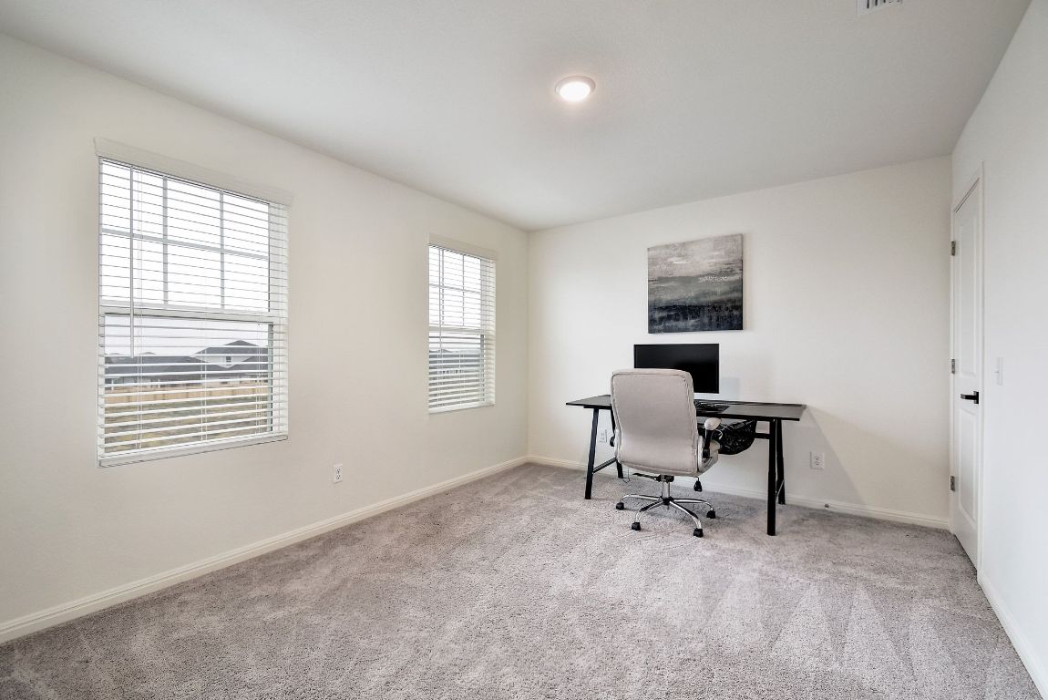414 Plateau Street Maxwell, TX 78656 - Photo 14 of 25 a workspace room with furniture and a window
