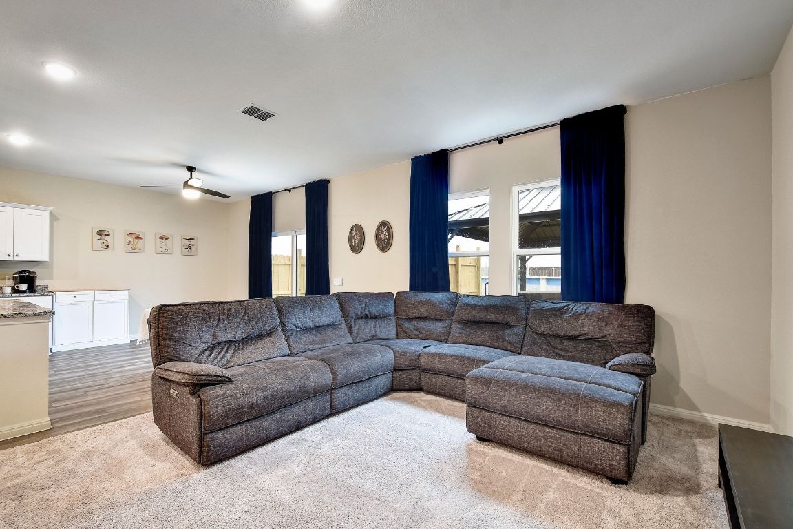 414 Plateau Street Maxwell, TX 78656 - Photo 3 of 25 a living room with furniture and a large window
