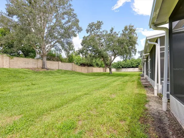 a view of a backyard with a small cabin