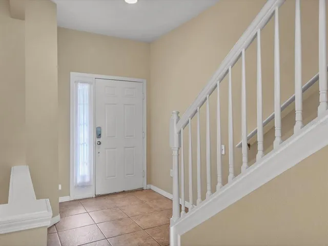 a view of an entryway with staircase