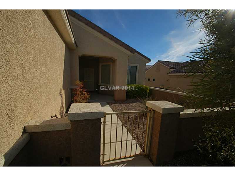 3043 Canal Walk Road Henderson, NV 89052 - Photo 3 of 29 Facade/Exterior Front. Gated Courtyard Entry