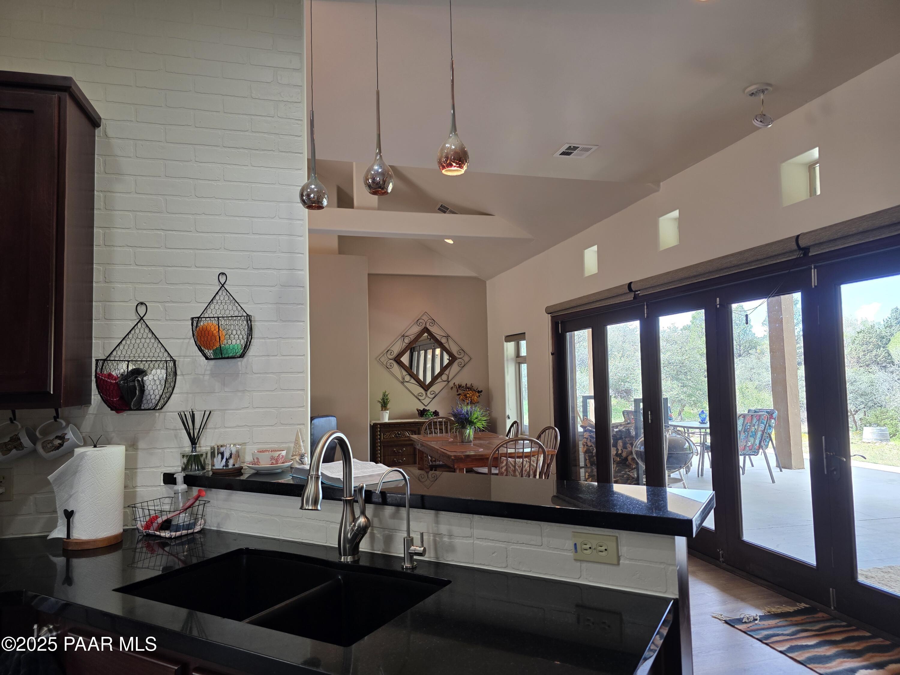 17180 West Model Creek Road Kirkland, AZ 86332 - Photo 11 of 53 a room with lots of counter space and furniture