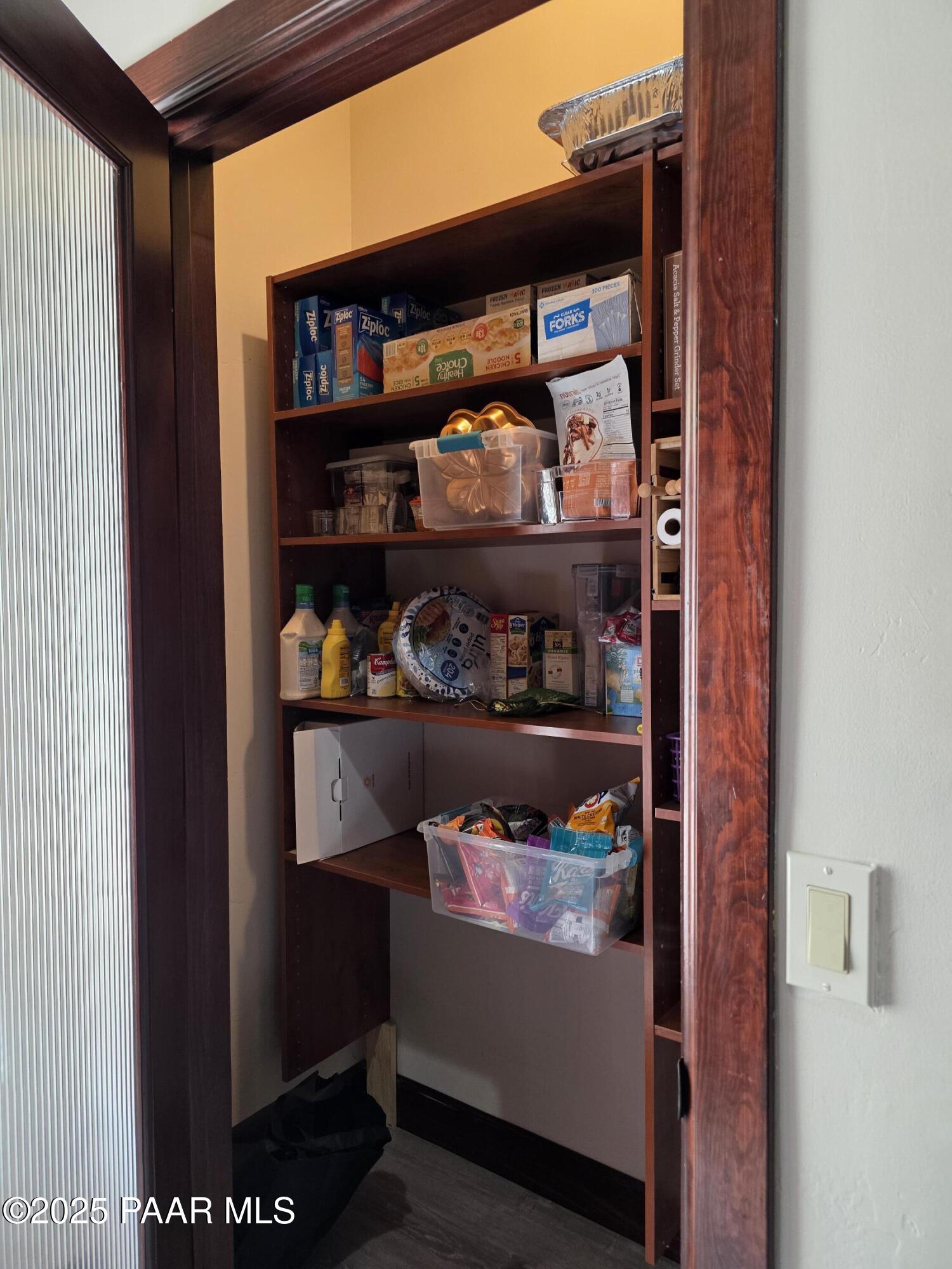 17180 West Model Creek Road Kirkland, AZ 86332 - Photo 16 of 53 a room with lots of different kinds of food