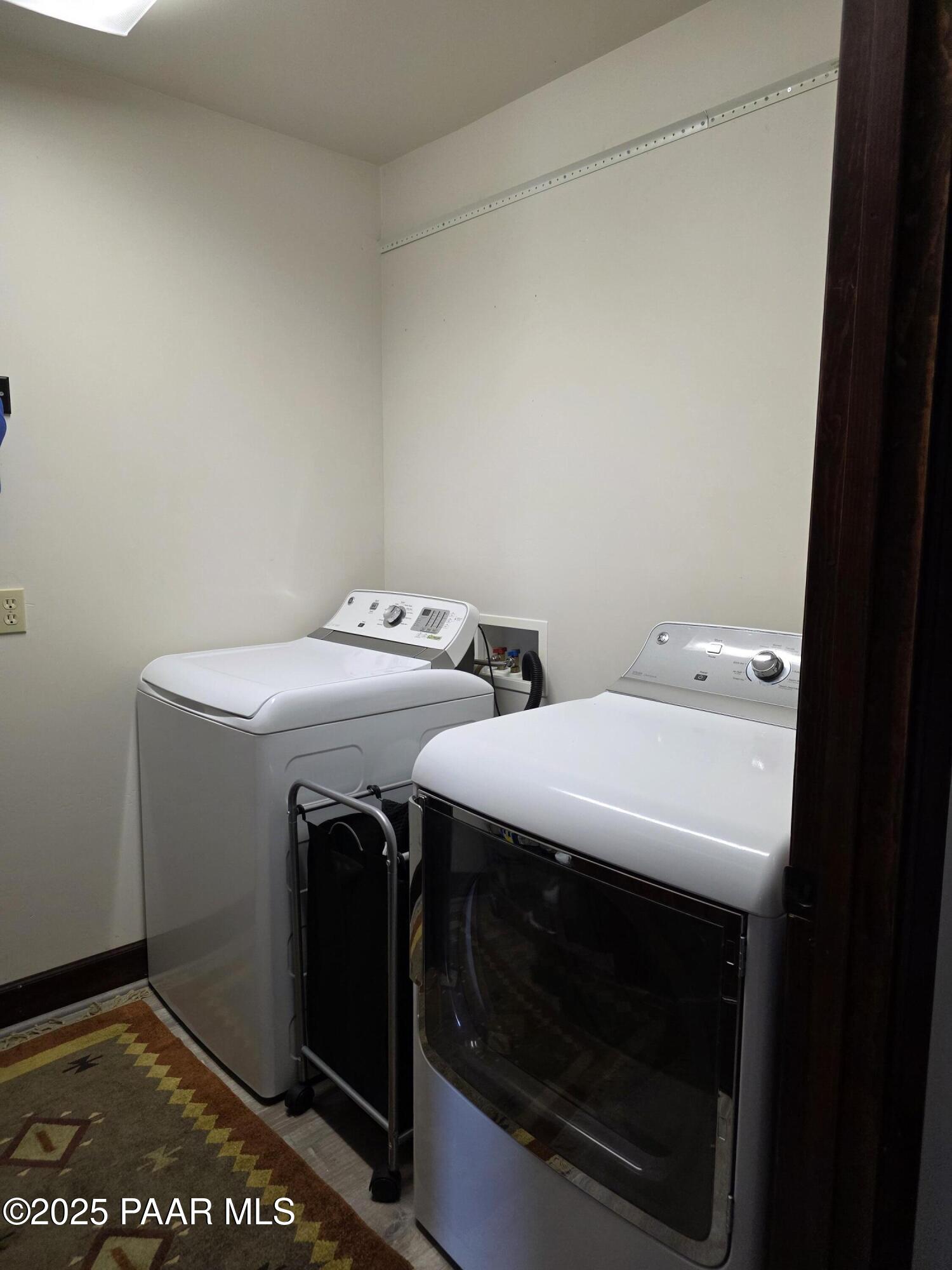 17180 West Model Creek Road Kirkland, AZ 86332 - Photo 18 of 53 a utility room with dryer and washer