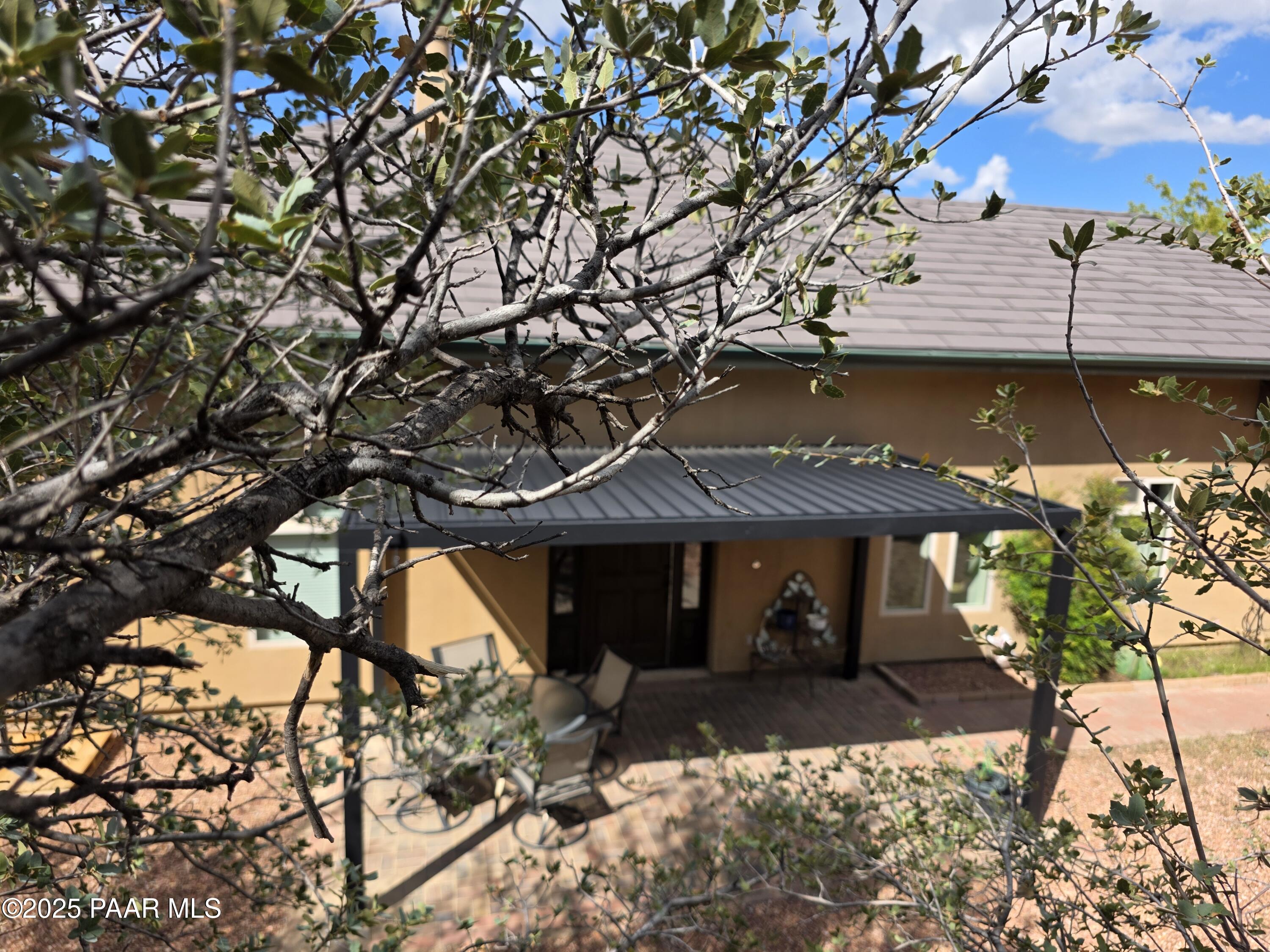 17180 West Model Creek Road Kirkland, AZ 86332 - Photo 2 of 53 a front view of a house with a yard