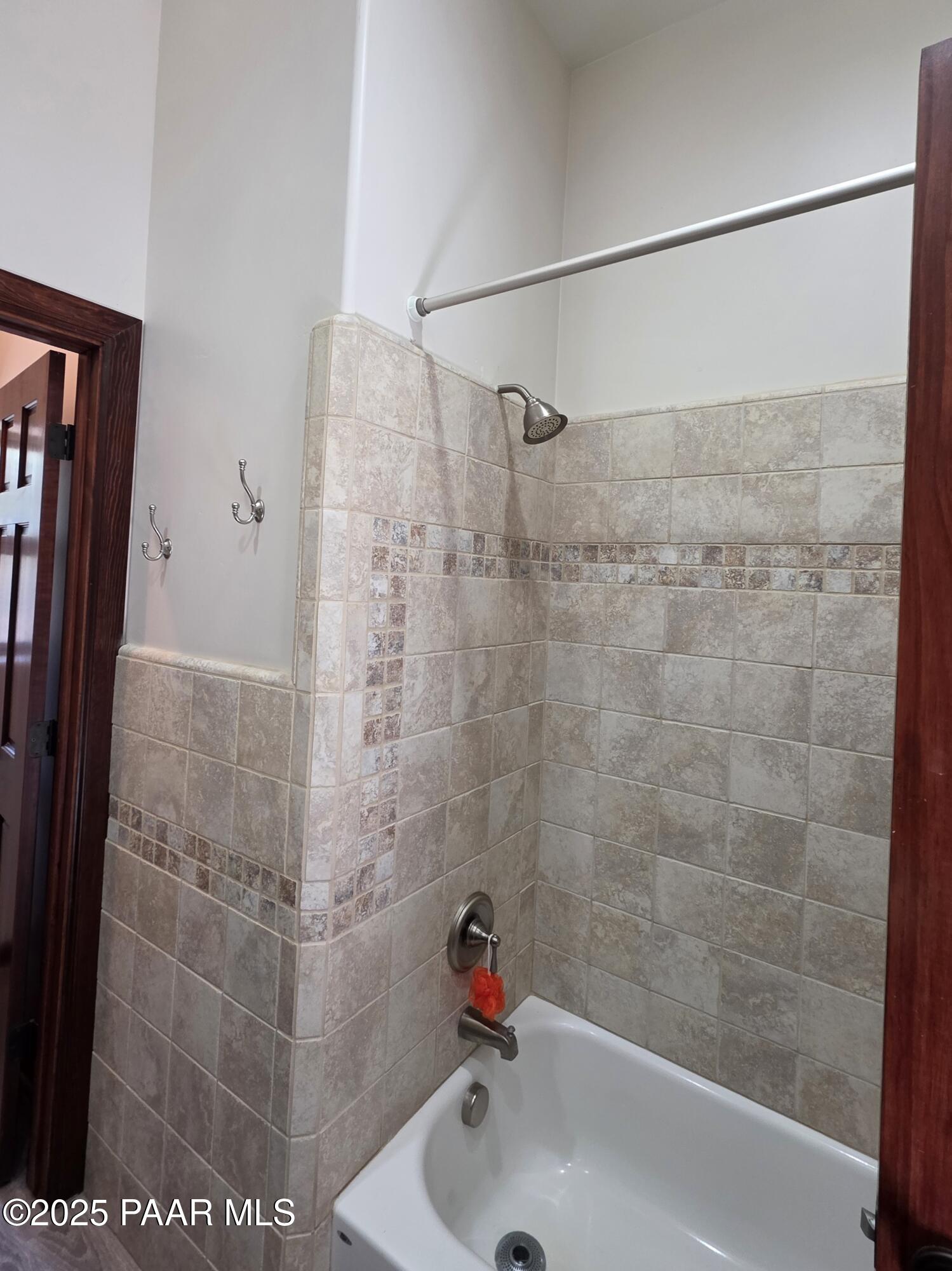 17180 West Model Creek Road Kirkland, AZ 86332 - Photo 23 of 53 a bathroom with a shower and a sink