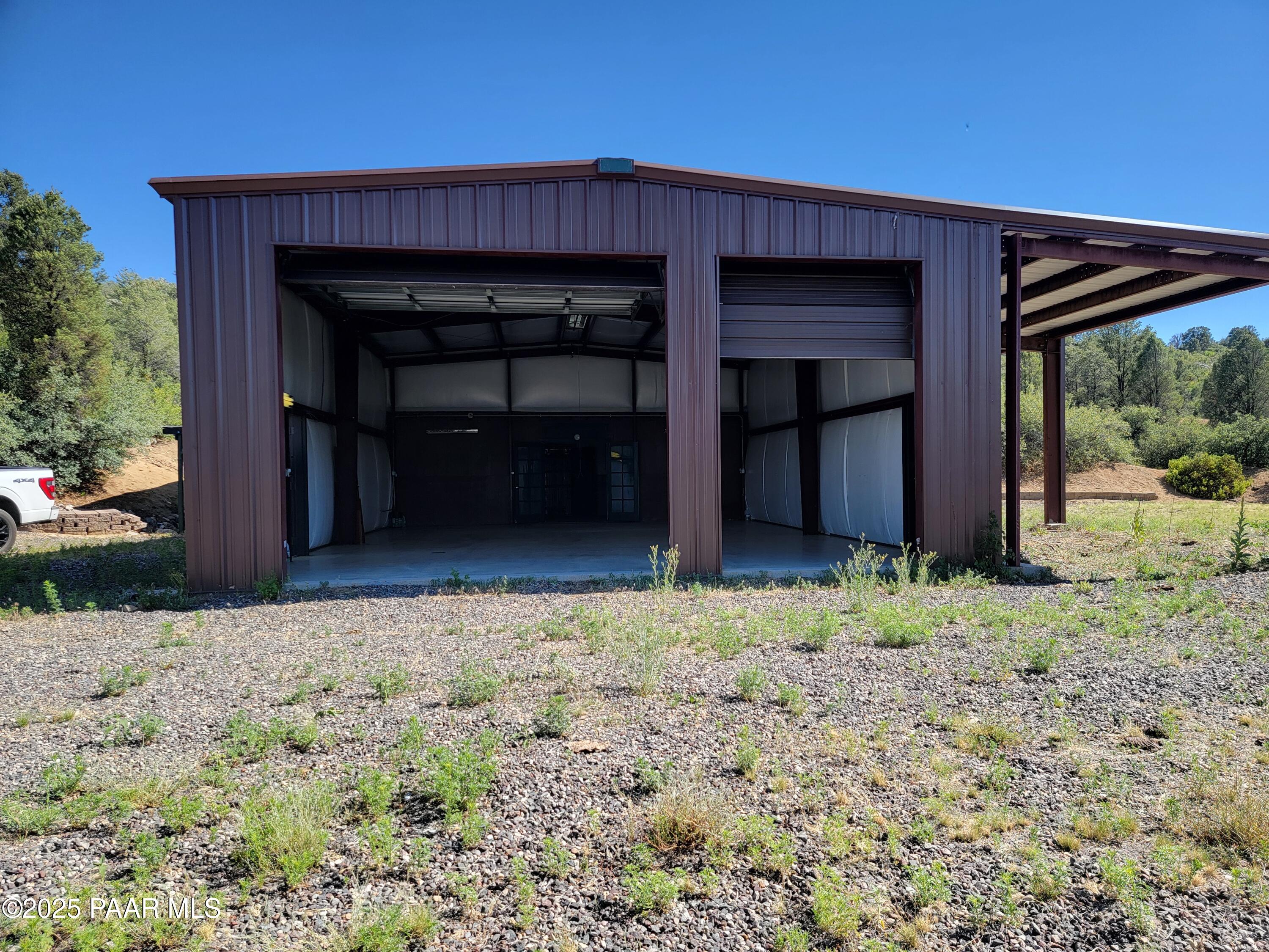 17180 West Model Creek Road Kirkland, AZ 86332 - Photo 47 of 53 a front view of a house