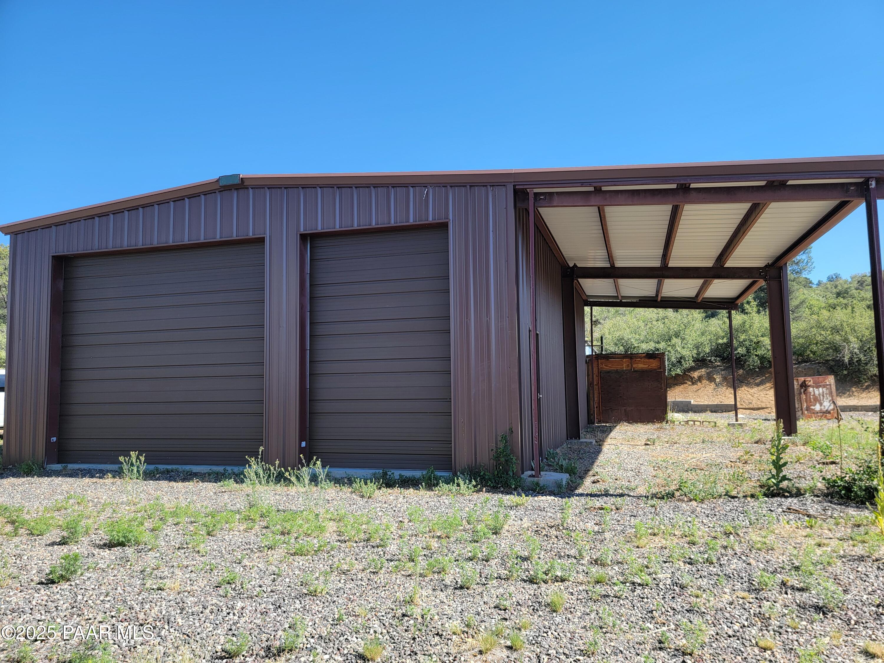 17180 West Model Creek Road Kirkland, AZ 86332 - Photo 50 of 53 a backyard of a house