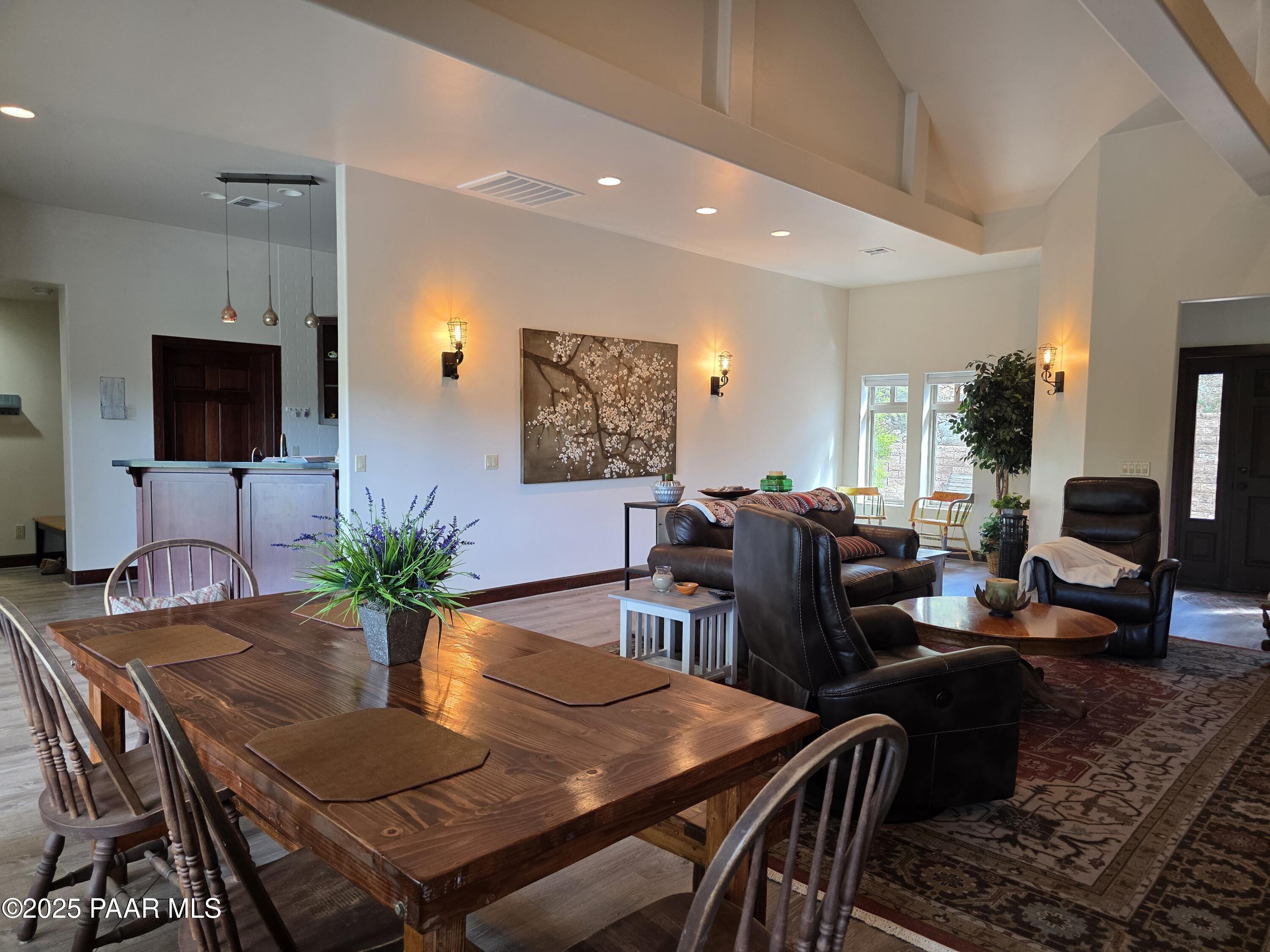 17180 West Model Creek Road Kirkland, AZ 86332 - Photo 9 of 53 a view of a dining room with furniture