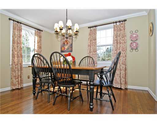 35 Walmsley Road Darien, CT 06820 - Photo 4 of 17 a view of a dining room with furniture window and wooden floor