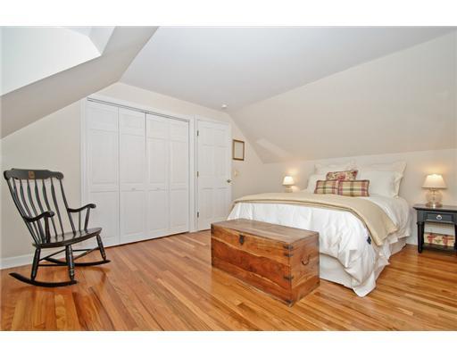 35 Walmsley Road Darien, CT 06820 - Photo 8 of 17 a bedroom with a bed and a chair