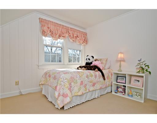 35 Walmsley Road Darien, CT 06820 - Photo 10 of 17 a bed room with a bed window and a table