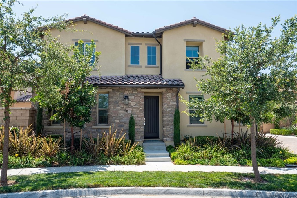 front view of a house with a yard