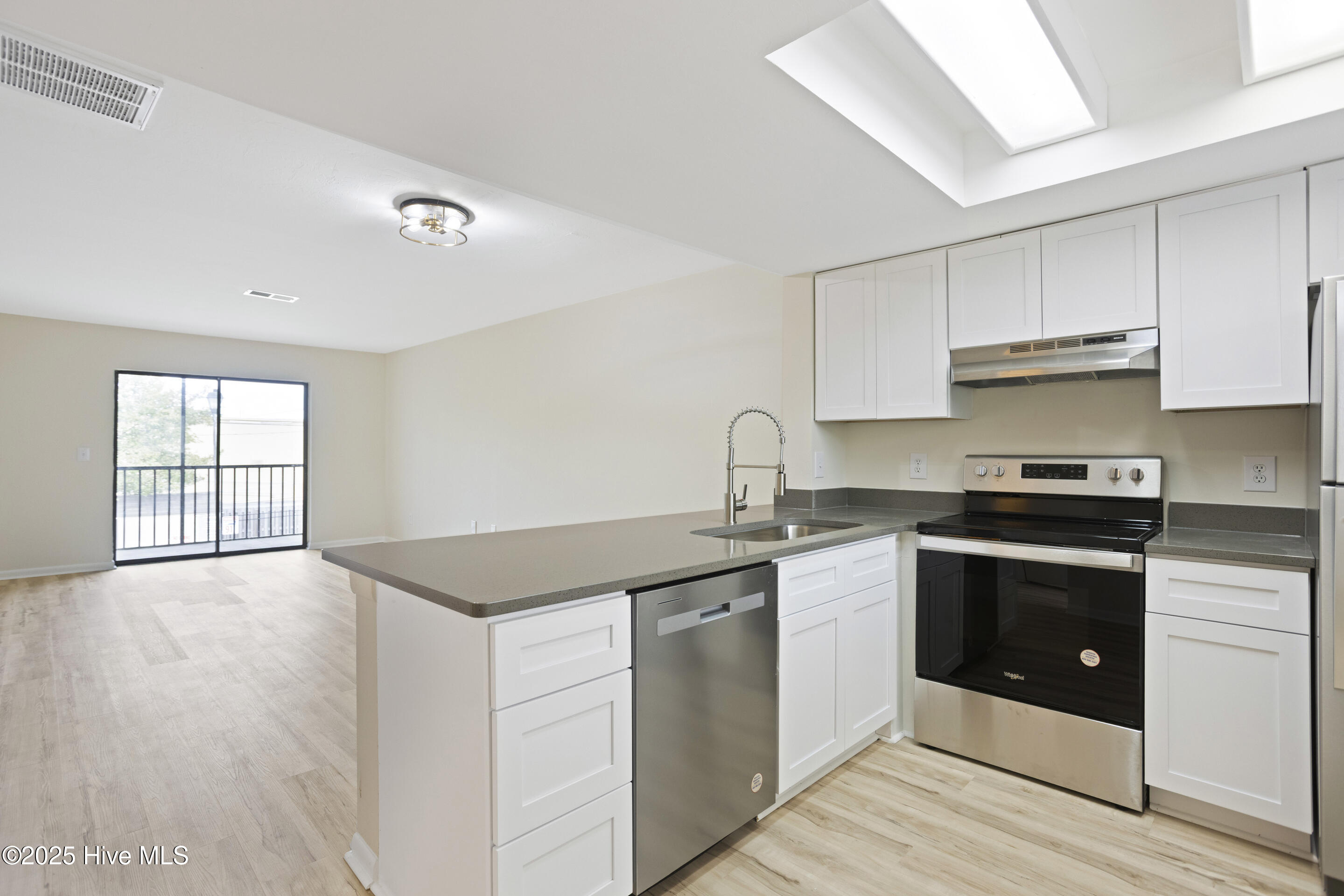 4459 Holly Tree Road Wilmington, NC 28412 - Photo 4 of 32 Kitchen to Living Room