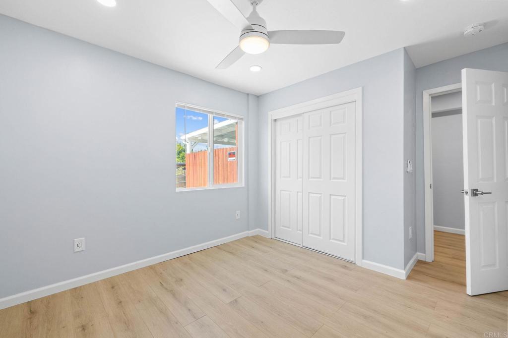 1908 Washington Street, Unit 2 Lemon Grove, CA 91945 - Photo 18 of 26 wooden floor in an empty room with a window