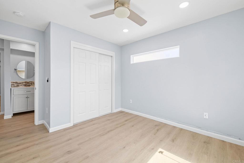 1908 Washington Street, Unit 2 Lemon Grove, CA 91945 - Photo 20 of 26 wooden floor in an empty room with a window