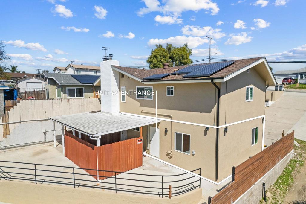 1908 Washington Street, Unit 2 Lemon Grove, CA 91945 - Photo 21 of 26 a house view with a sink and yard in the background