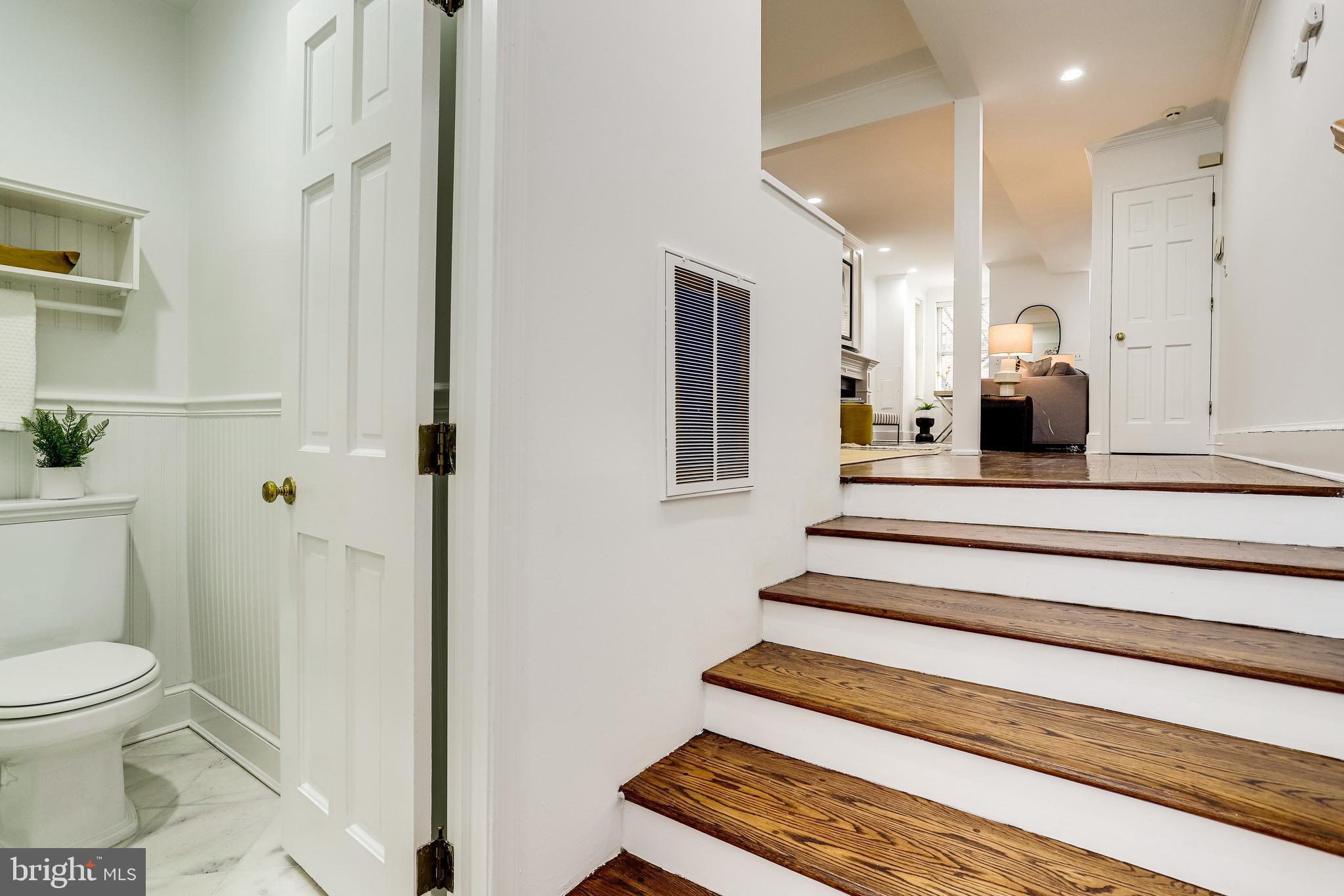 421 First Street Southeast Washington, DC 20003 - Photo 11 of 64 Step down to discreetly-located half bath