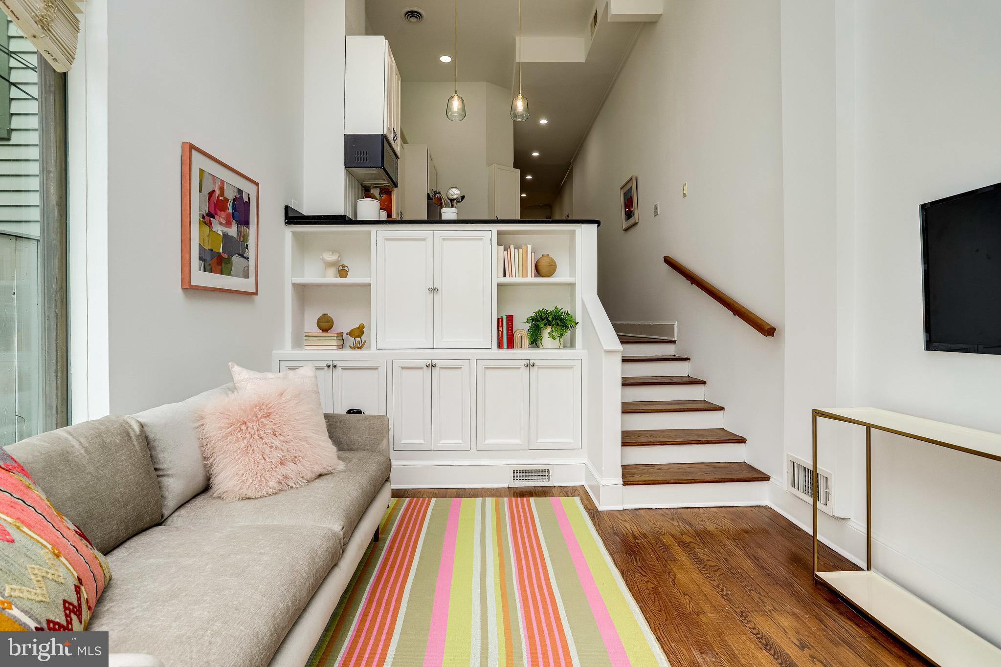 421 First Street Southeast Washington, DC 20003 - Photo 18 of 64 Flexible family room/WFH space has built-ins