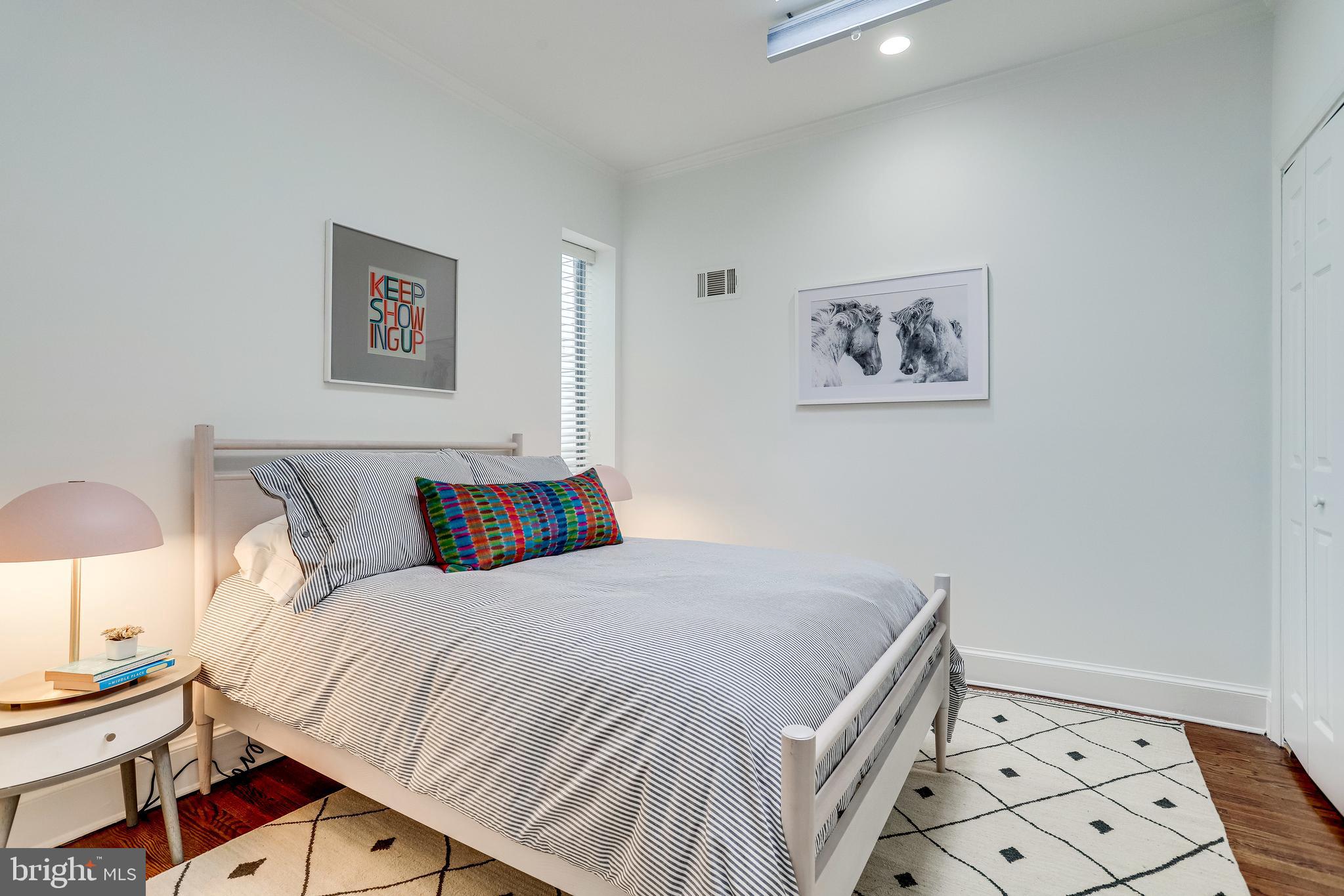 421 First Street Southeast Washington, DC 20003 - Photo 26 of 64 Middle BR has skylight w/shade + side window