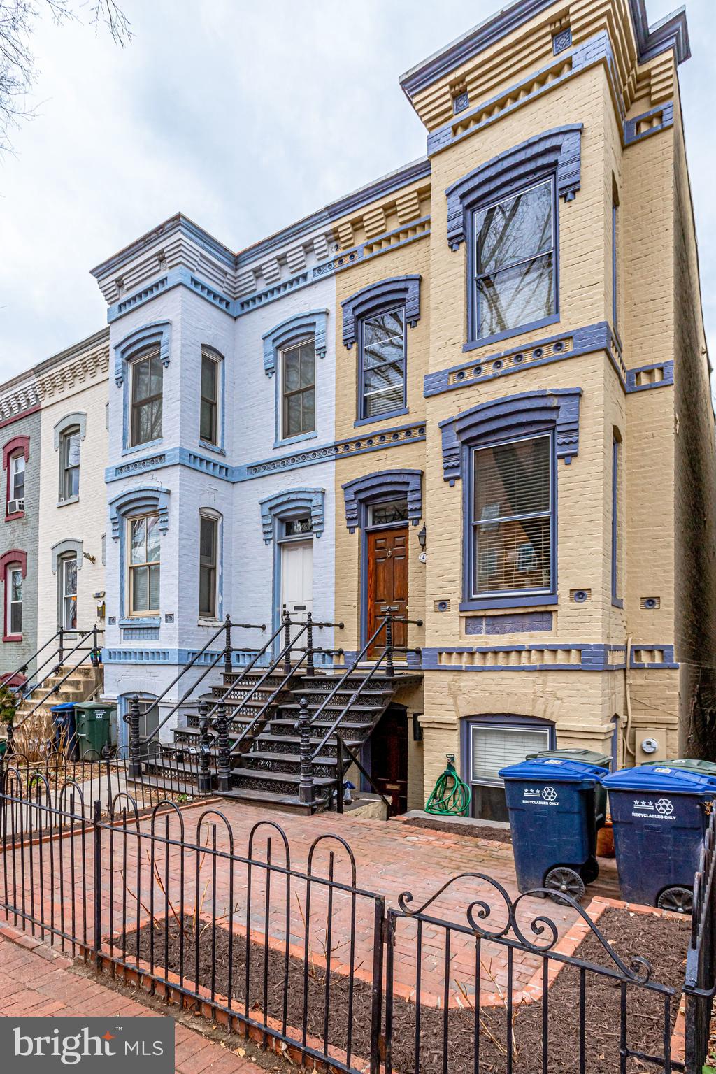 421 First Street Southeast Washington, DC 20003 - Photo 3 of 64 Pleasant brick patio and planting beds out front