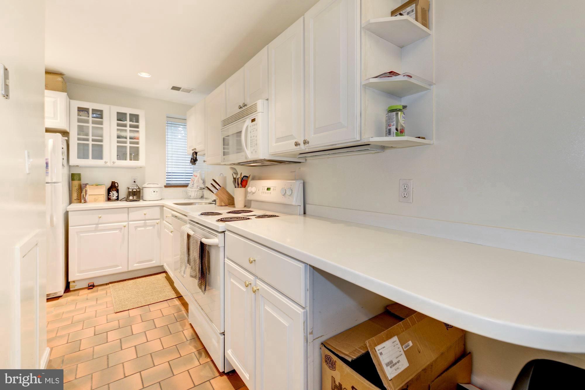 421 First Street Southeast Washington, DC 20003 - Photo 42 of 64 Breakfast bar and plenty of counter space