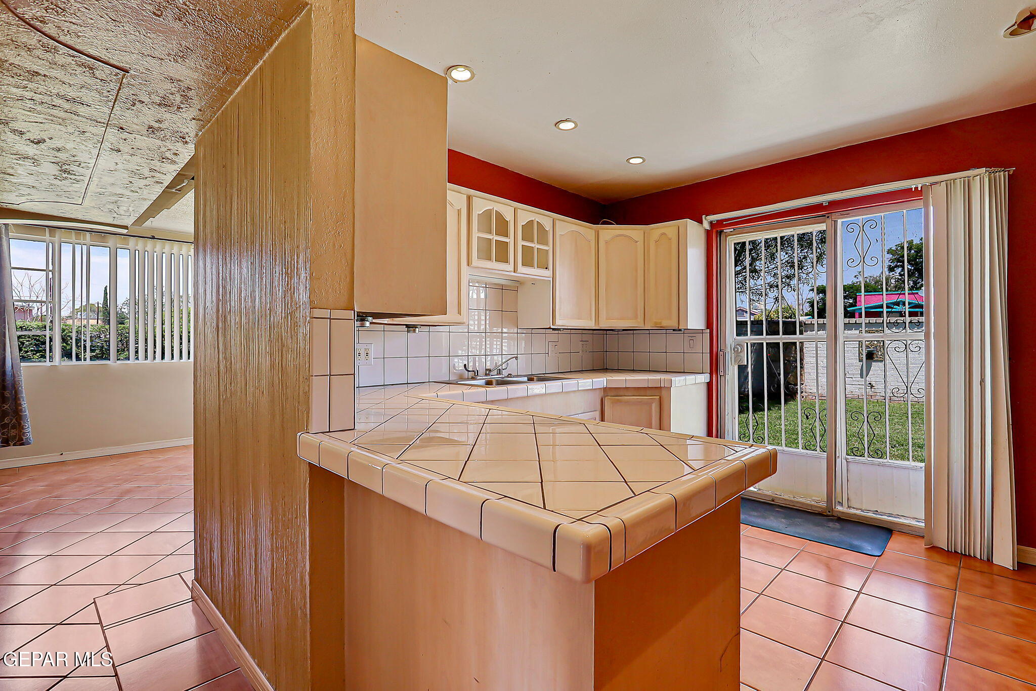 122 North Pendell Road El Paso, TX 79905 - Photo 17 of 62 a kitchen that has a sink and a stove