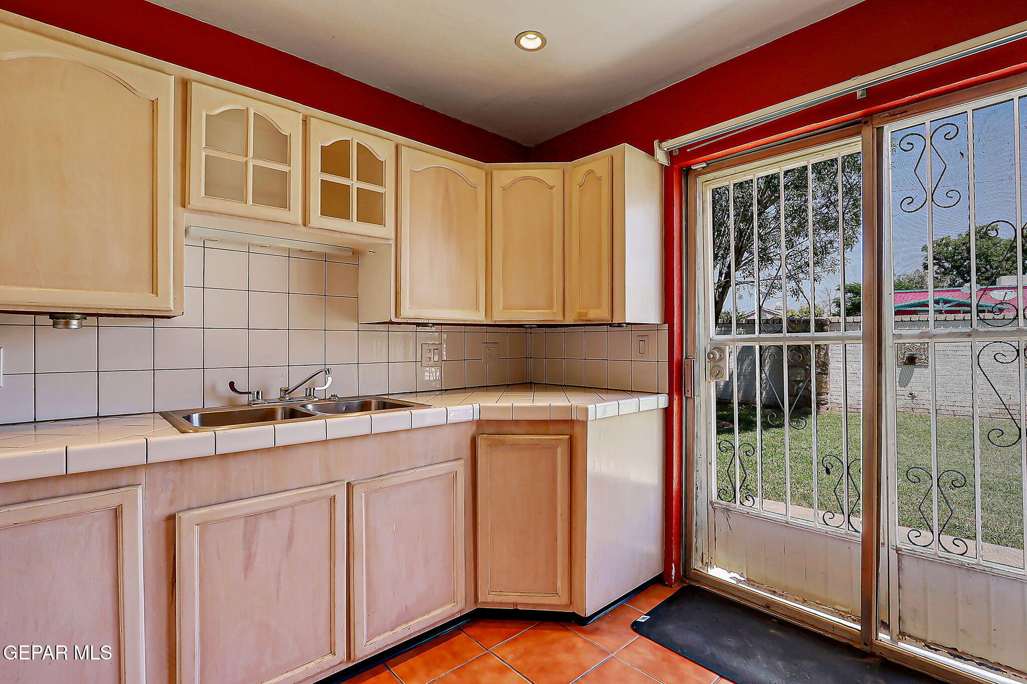 122 North Pendell Road El Paso, TX 79905 - Photo 19 of 62 a kitchen with a sink stove and cabinets