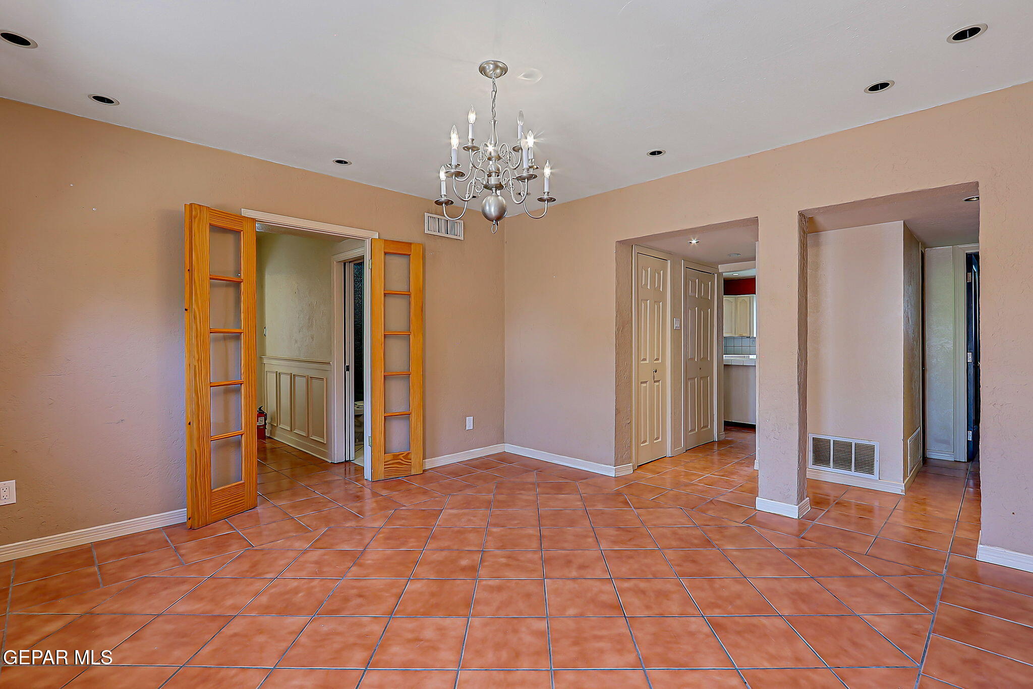 122 North Pendell Road El Paso, TX 79905 - Photo 29 of 62 a view of a livingroom with a chandelier