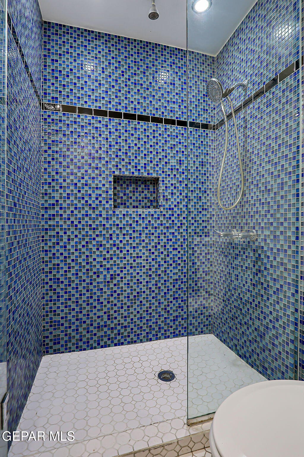 122 North Pendell Road El Paso, TX 79905 - Photo 42 of 62 a bathroom with a shower and a toilet