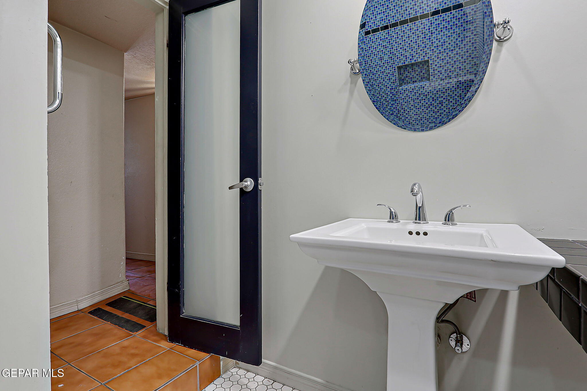 122 North Pendell Road El Paso, TX 79905 - Photo 43 of 62 a bathroom with a sink and a mirror