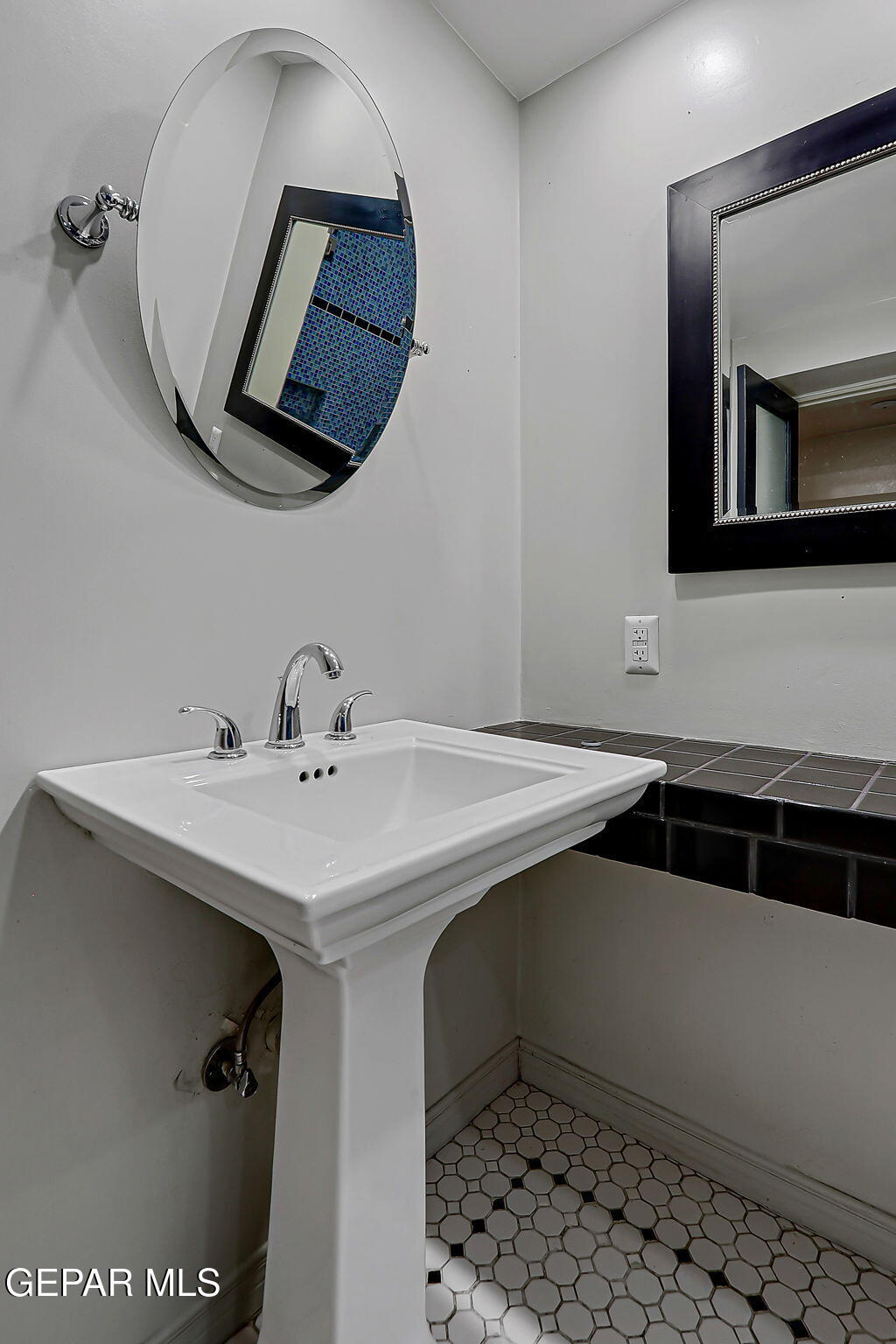 122 North Pendell Road El Paso, TX 79905 - Photo 45 of 62 a bathroom with a sink and a mirror