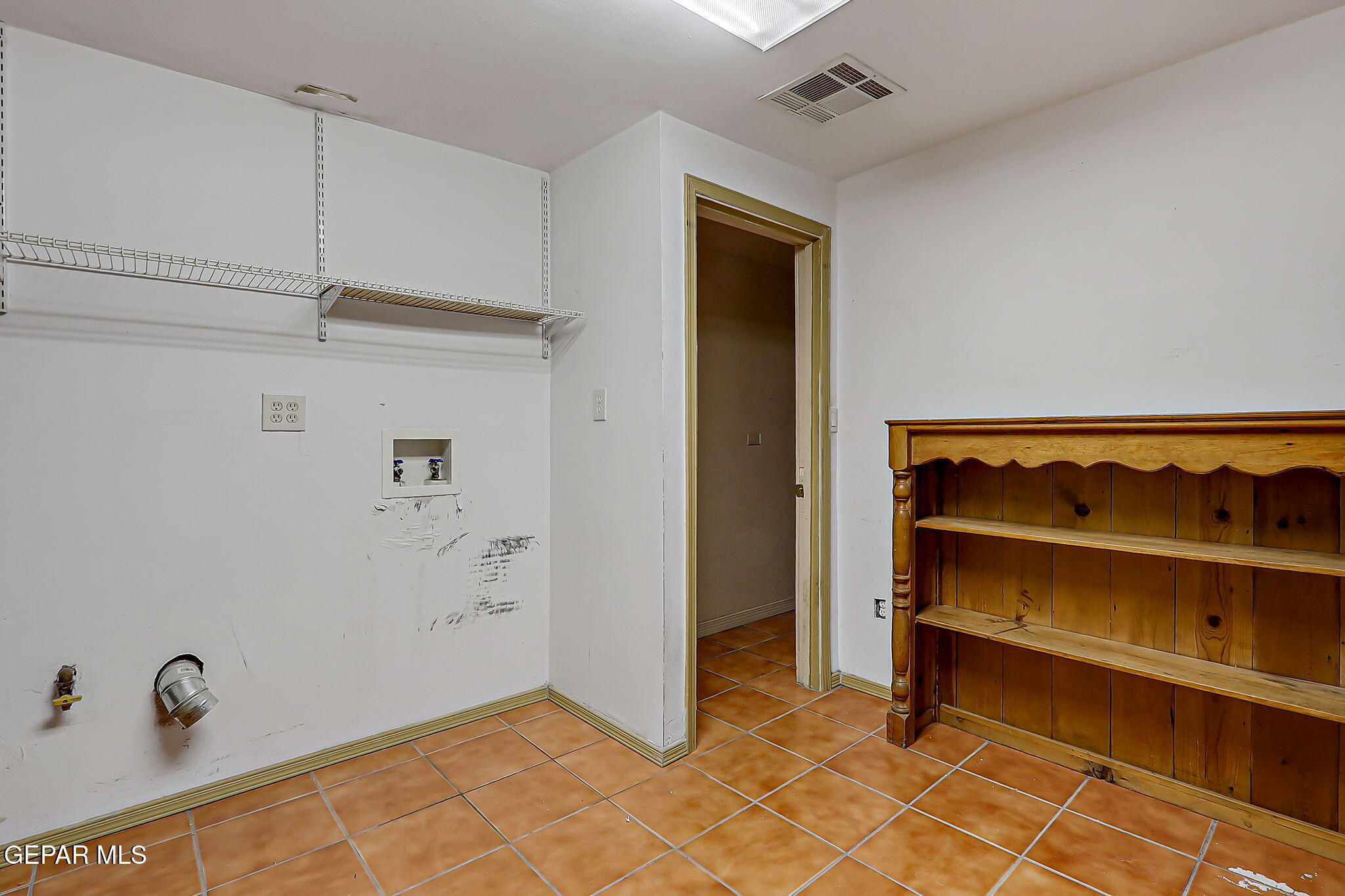 122 North Pendell Road El Paso, TX 79905 - Photo 47 of 62 a view of walk in closet with empty racks