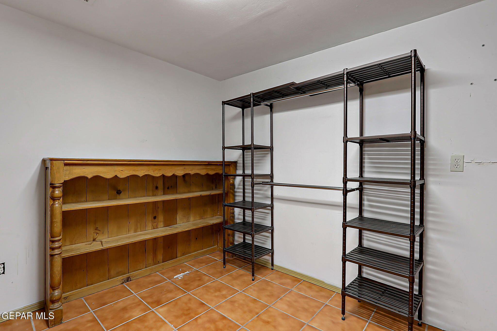 122 North Pendell Road El Paso, TX 79905 - Photo 48 of 62 a view of walk in closet with empty racks